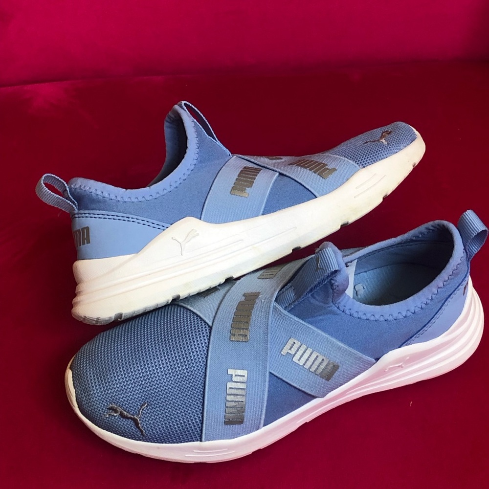 Little girl Puma tennis shoe baby and white